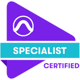 Purple Triangular logo with a teal ribbon on top. Inside the rectangular teal ribbon is the word "Specialist" in all white capitalized font. Underneath the word "Specialist", next to the triangular logo, is the word "Certified" in purple and all caps. The
